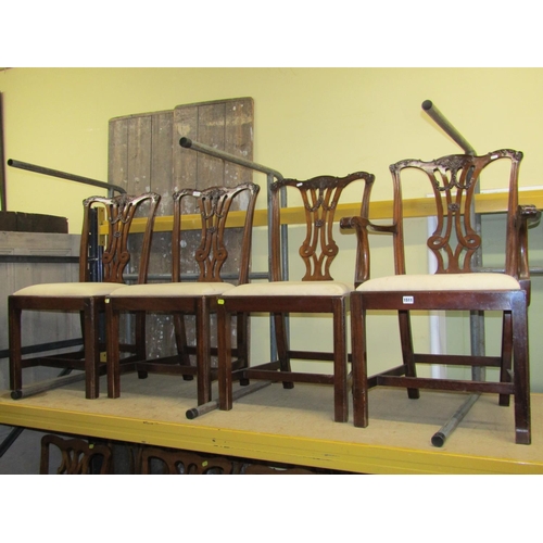 1511 - A set of six (4+2) mahogany dining chairs in a Georgian style with carved and pierced splats with sh... 