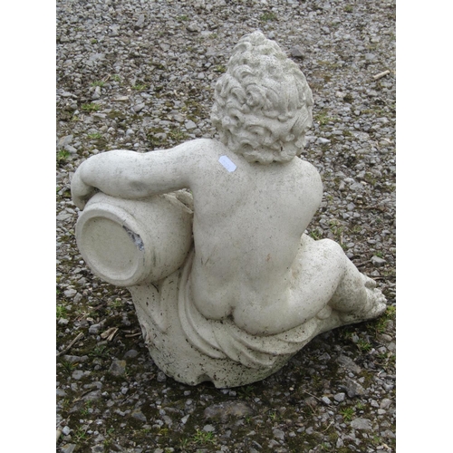 67 - A cast composition stone water feature in the form of a seated putti clutching a barrel shaped recep... 