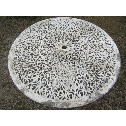 71 - A cream painted cast aluminium two tier garden terrace table of circular form, with decorative pierc... 