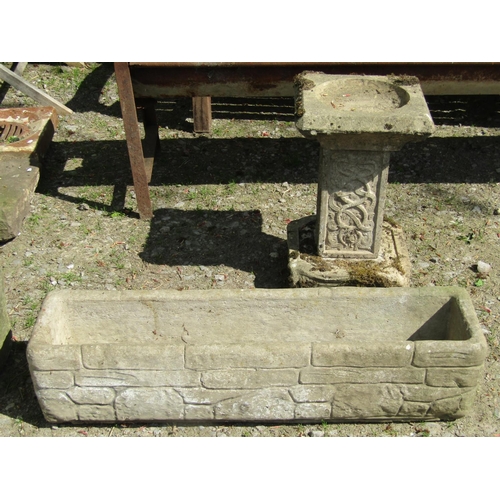 314 - A pair of novelty cast composition stone garden planters in the form of old boots, 50 cm long x 22 c... 