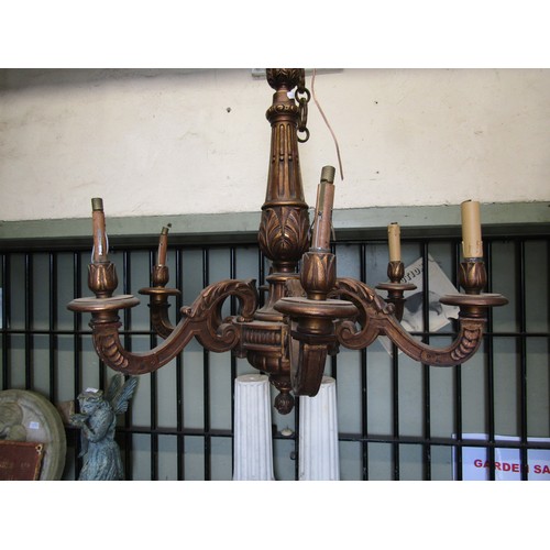 740 - A carved and gilded five branch ceiling light, 90cm high x 80cm wide