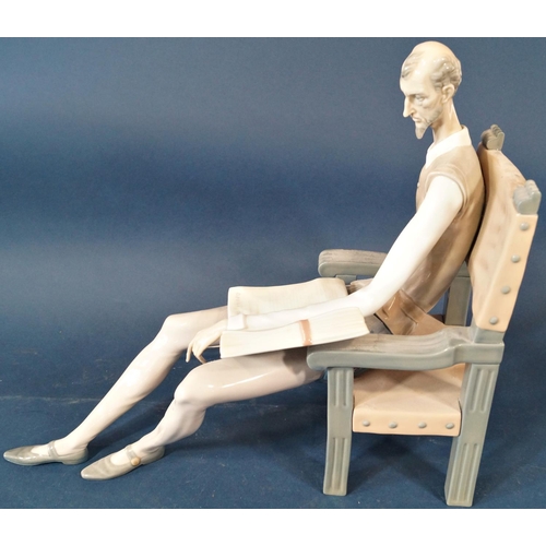 1006 - A Lladro porcelain figure of Don Quixote seated in a chair and reading a book with a sword in his ha... 