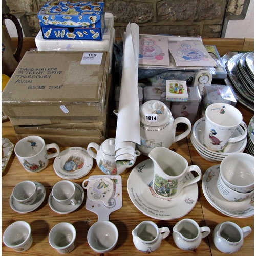 1014 - An extensive collection of Wedgwood Beatrix Potter china collectables to include teapots, milk jugs,... 