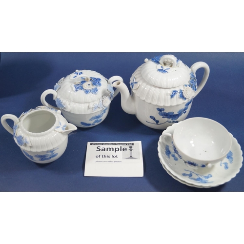 1074 - Three piece continental porcelain tea set, teapot, sugar basin and cream jug with applied and overla... 