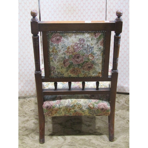 2077 - An aesthetic period nursing chair with geometric detail on turned spindle mouldings and turned suppo... 