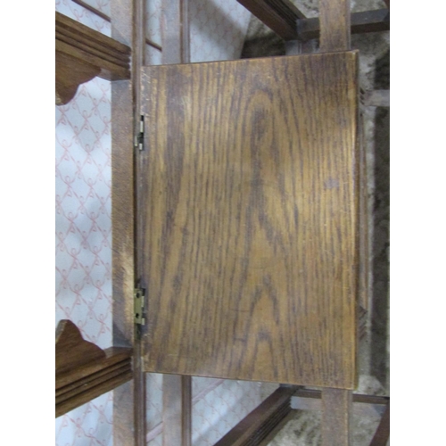 2110 - Late 19th century oak hall stand of full height with lozenge shaped mirror panel and two ceramic til... 