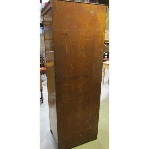 2118 - An early 20th century oak freestanding hall robe, with applied mouldings, enclosed by a full length ... 