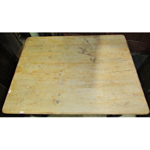 2128 - A pine kitchen table with scrub top on four turned supports, 105 cm wide