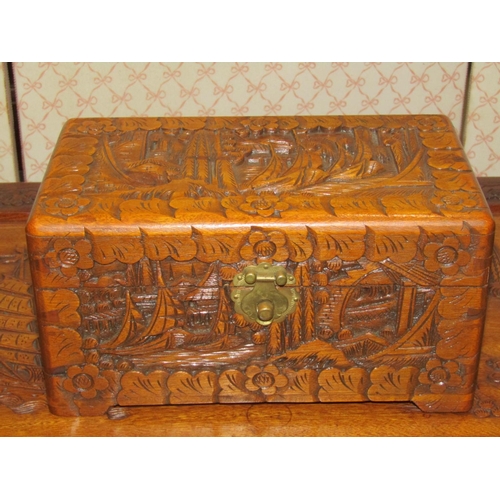 2164 - A Chinese camphor wood blanket chest with carved panelled detail and a further similar jewel box