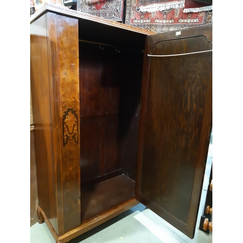 2177 - A 1920s walnut and figured walnut wardrobe with floral marquetry detail on short cabriole supports 1... 