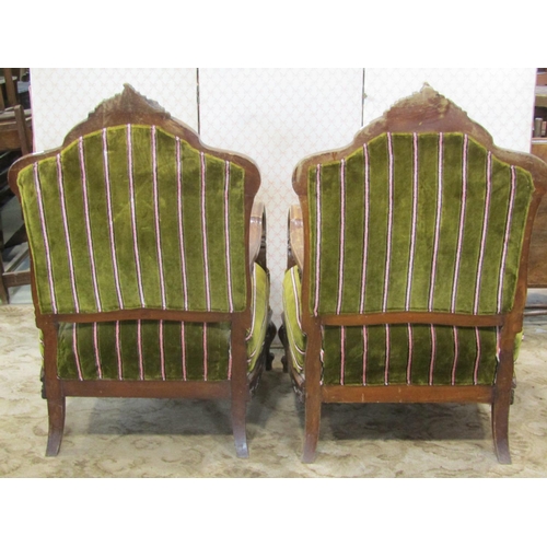 2212 - A pair of small drawing room chairs with carved showwood frames, upholstered seat and back panels