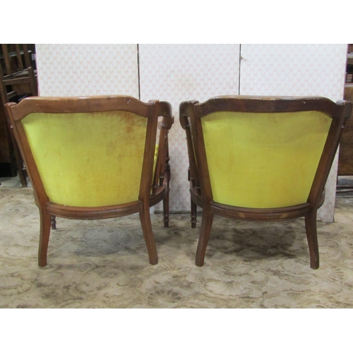 2217 - A pair of drawing room chairs, the carved and shaped showwood frames with upholstered finish