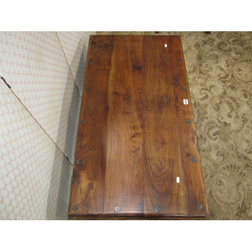 2224 - An Indian hardwood occasional table with steel mounts, 110 cm max