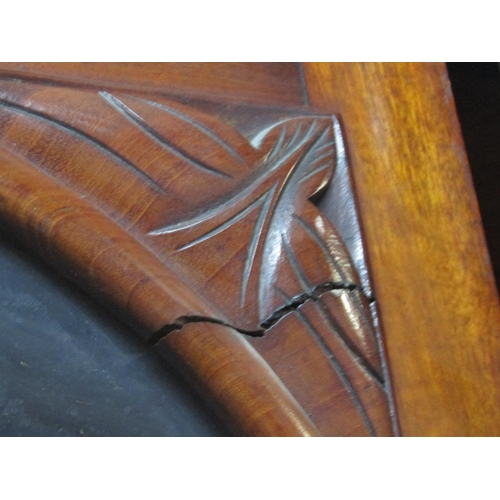 2251 - Victorian library bookcase, the lower section enclosed by a pair of arched panelled doors and a serp... 