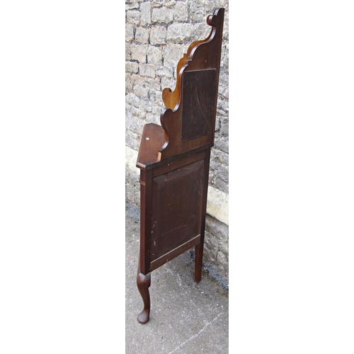 2274 - An Edwardian walnut freestanding corner cabinet enclosed by an astragal glazed panelled door beneath... 