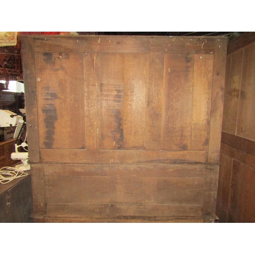 2278 - 19th century chestnut buffet, the lower section enclosed by two panelled doors and two frieze drawer... 