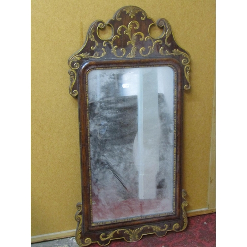 2303 - Georgian style wall mirror of rectangular form with gilded scrolling detail, together with a further... 