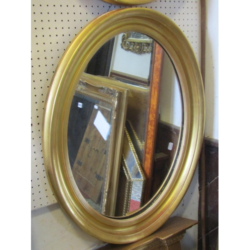 2322 - Pair of 19th century oval wall mirrors with reeded and moulded frames, 72cm max