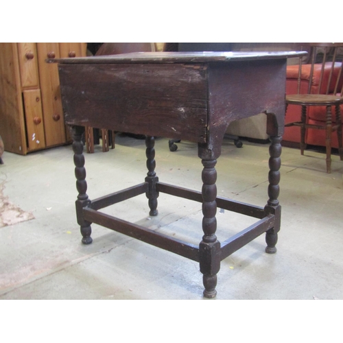 2333 - Georgian country made oak side table fitted with three frieze drawers with shaped apron and bobbin m... 