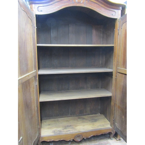 2339 - 18th century provincial French walnut armoire enclosed by a pair of panelled doors with steel hinges... 