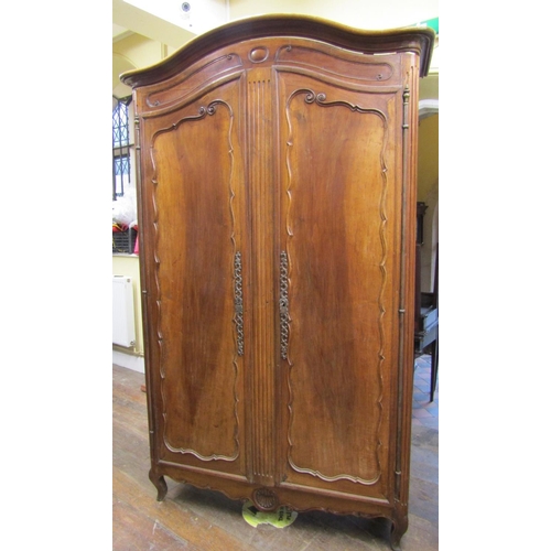 2339 - 18th century provincial French walnut armoire enclosed by a pair of panelled doors with steel hinges... 