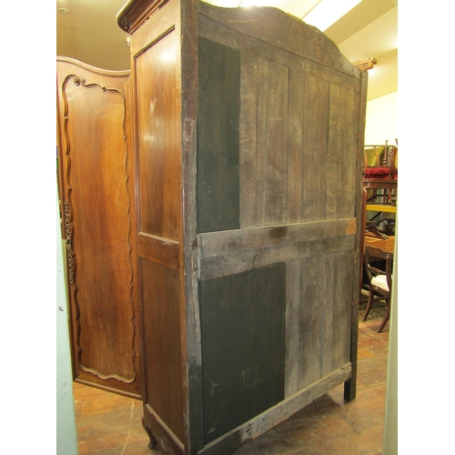 2339 - 18th century provincial French walnut armoire enclosed by a pair of panelled doors with steel hinges... 