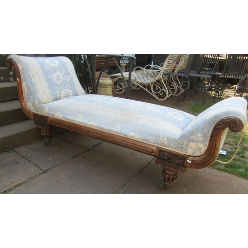 2342 - Regency mahogany chaise lounge with scrolled ends, carved showwood frame raised on fluted supports