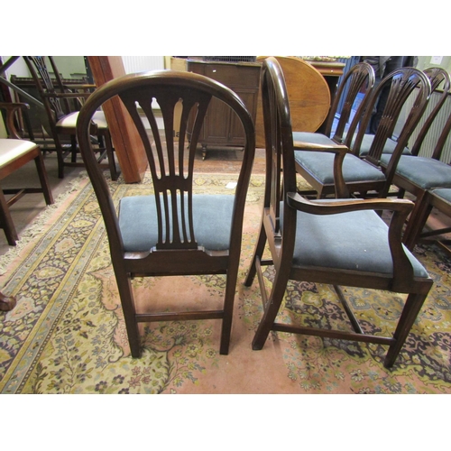 2343 - A set of eight (2+6) Hepplewhite style mahogany dining chairs with carved and pierced splats with wh... 