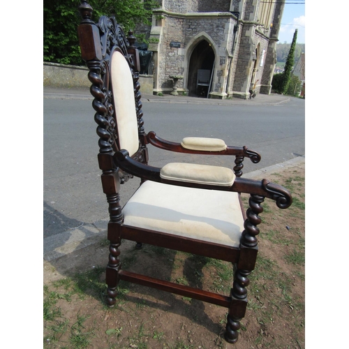 2344 - 19th century walnut elbow chair in the carolean manner with deeply carved and pierced detail with up... 