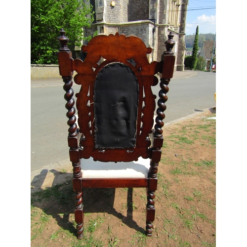 2344 - 19th century walnut elbow chair in the carolean manner with deeply carved and pierced detail with up... 