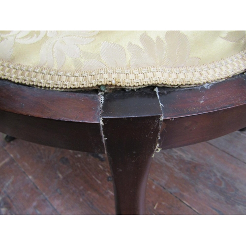 2350 - An inlaid Edwardian mahogany and rosewood tub chair with stick back and sides, shaped supports and a... 