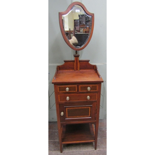 2357 - An inlaid Edwardian mahogany gentleman's shaving stand, the base enclosed by an arrangement of drawe... 