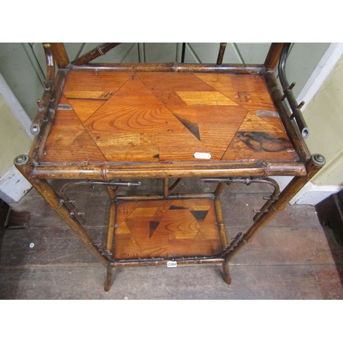 2384 - A Bamboo side table with four tiers, gilded highlights and geometric marquetry panels, 45cm high