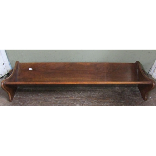 2388 - A walnut book trough with pegged frame, 85cm long