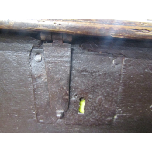 2399 - An 18th century oak six plank coffer with original steel lock plate and hasp, together with carrying... 