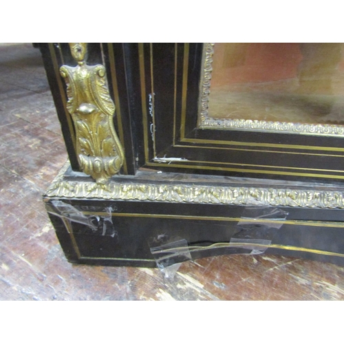 2404 - A pair of Victorian brass and ebonised inlaid pier cabinets, each enclosed by a pair of panelled gla... 