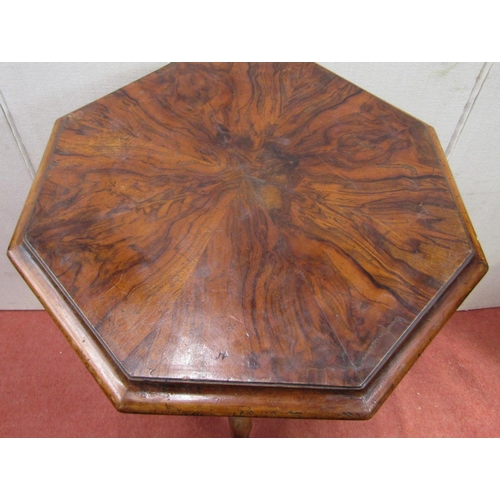 2407 - A mid-Victorian walnut and figured walnut sewing box of octagonal design, raised on a spiral twist v... 