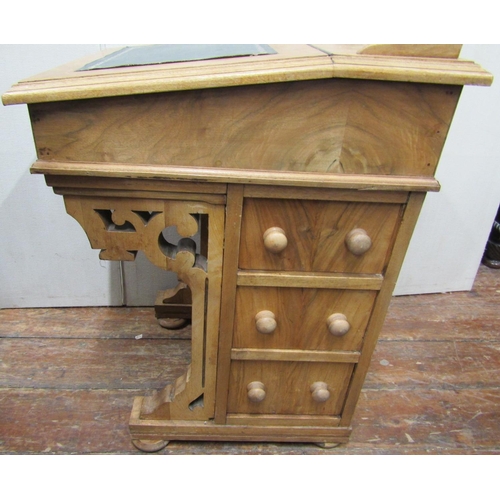 2408 - A Victorian style walnut davenport fitted with an arrangement of drawers, the fall flap enclosing a ... 