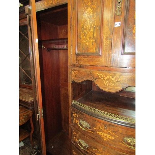 2410 - A late 19th century rosewood triple compactum wardrobe, the bow fronted centre fitted with an arrang... 