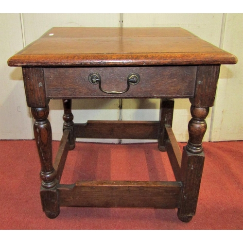 2415 - An Old English style oak occasional table, square cut form on turned supports, 47cm square