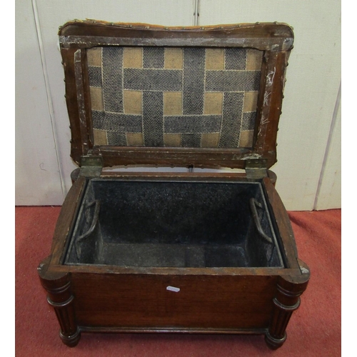 2417 - An Edwardian oak coal box of rectangular form, raised on turned and fluted supports with upholstered... 