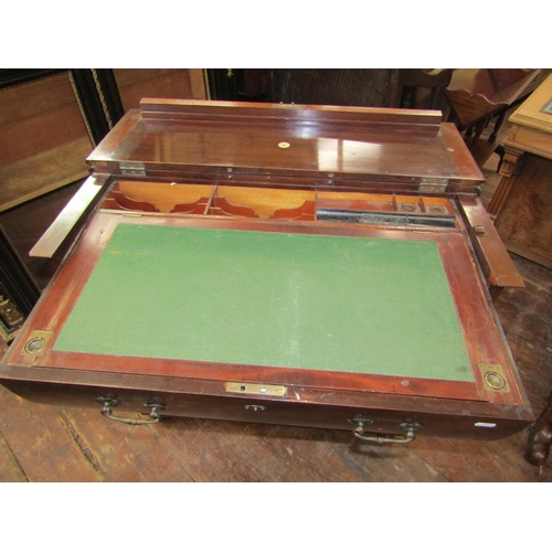 2421 - An Edwardian mahogany compactum writing desk by Simpson and Sons of Halifax and Blackburn, the foldo... 