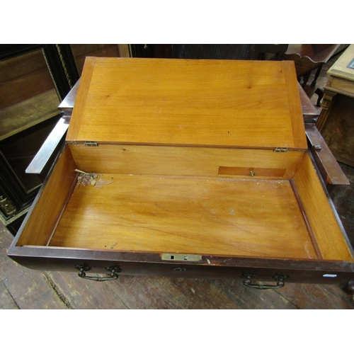 2421 - An Edwardian mahogany compactum writing desk by Simpson and Sons of Halifax and Blackburn, the foldo... 