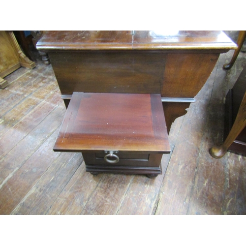 2421 - An Edwardian mahogany compactum writing desk by Simpson and Sons of Halifax and Blackburn, the foldo... 