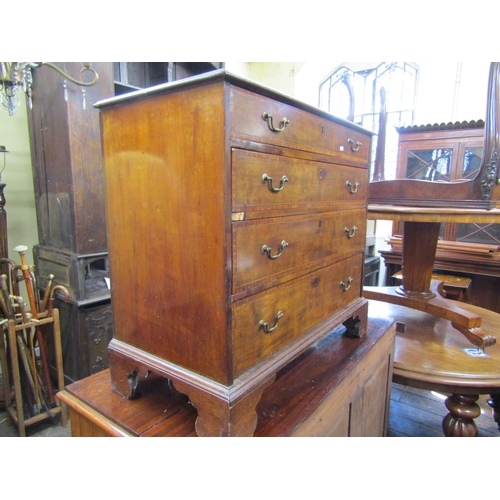 2428 - A small inlaid Edwardian mahogany chest of four long graduated drawers crossbanded in satinwood rais... 