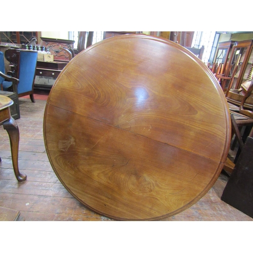 2432 - A good quality Victorian mahogany extending dining table circular when closed and raised on four pro... 