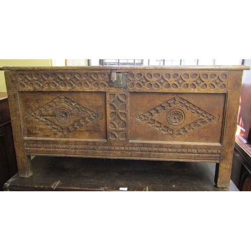 2435 - Early 18th century oak coffer with panelled framework, the front elevation with repeating geometric ... 