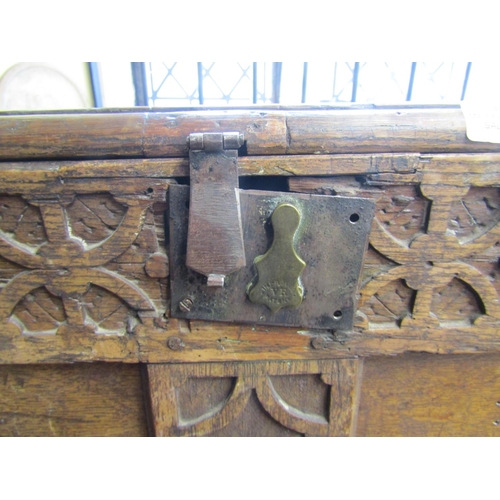 2435 - Early 18th century oak coffer with panelled framework, the front elevation with repeating geometric ... 