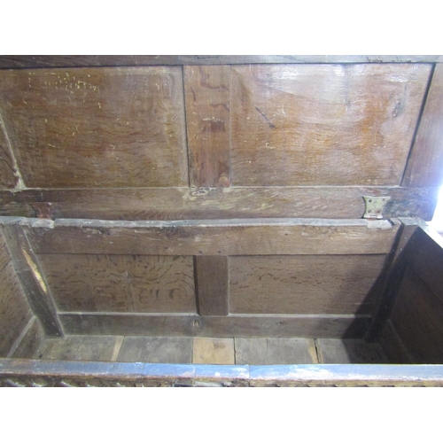 2435 - Early 18th century oak coffer with panelled framework, the front elevation with repeating geometric ... 