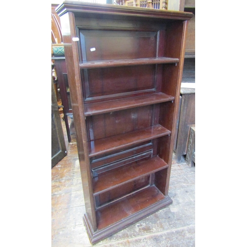 2437 - 19th century mahogany open bookcase with panelled back incorporating four graduated shelves set on a... 